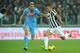 TURIN, ITALY - NOVEMBER 10: Arturo Vidal (R) of Juventus competes with Valon Behrami of SSC Napoli during the Serie A match between Juventus and SSC Napoli at Juventus Arena on November 10, 2013 in Turin, Italy. (Photo by Valerio Pennicino/Getty Images)