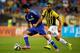 ARNHEM, NETHERLANDS - JULY 30: Diego Costa of Chelsea gets past Zakaria Labyad of Vitesse during the pre season friendly match between Vitesse Arnhem and Chelsea at the Gelredome Stadium on July 30, 2014 in Arnhem, Netherlands. (Photo by Dean Mouhtaropo