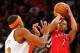 NEW YORK, NY - APRIL 16: Kyle Lowry #7 of the Toronto Raptors takes a shot as Toure Murry #23 of the New York Knicks defends in the first half during an NBA basketball game at Madison Square Garden on April. 16, 2014 in New York City. NOTE TO USER: User e