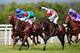 CHICHESTER, ENGLAND - AUGUST 01: Jimmy Fortune riding Red Avenger (R) comes through to win The Betfred Mile at Goodwood racecourse on August 01, 2014 in Chichester, England. (Photo by Charlie Crowhurst/Getty Images)