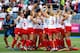 GLASGOW, SCOTLAND - AUGUST 01: The England players celebrate as goal keeper Maddie Hinch saves the deciding penalty shuttle to put England through to the Gold Medal final during the Women's Hockey Semi Final between New Zealand and England at Glasgow Nat