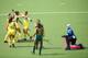 GLASGOW, SCOTLAND - AUGUST 01: Kellie White of Australia celebrates scoring the second goal in the Women's Hockey Semi Final between South Africa and Australia at Glasgow National Hockey Centre during day nine of the Glasgow 2014 Commonwealth Games on Au