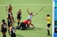GLASGOW, SCOTLAND - AUGUST 01: Lily Owsley of England celebrates scoring the opening goal during the Women's Hockey Semi Final between New Zealand and England at Glasgow National Hockey Centre during day nine of the Glasgow 2014 Commonwealth Games on Aug