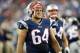 Aug 16, 2013; Foxborough, MA, USA; New England Patriots defensive tackle Joe Vellano (64) on the sideline during the third quarter against the Tampa Bay Buccaneers at Gillette Stadium. The New England Patriots won 25-21. Mandatory Credit: Greg M. Cooper