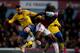 LONDON, ENGLAND - DECEMBER 26: Thomas Vermaelen of Arsenal battles with Carlton Cole of West Ham United during the Barclays Premier League match between West Ham United and Arsenal at Boleyn Ground on December 26, 2013 in London, England. (Photo by Bryn