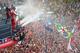MONZA, ITALY - SEPTEMBER 08: Race winner Sebastian Vettel (L) of Germany and Infiniti Red Bull Racing, second placed Fernando Alonso (R) of Spain and Ferrari and third placed Mark Webber (C) of Australia and Infiniti Red Bull Racing celebrate on the podi