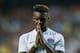 HONG KONG - JULY 29: Jean-Christophe Bahebeck of Paris Saint-Germain reacts after missing an opportunity to score during the friendly match between Kitchee and Paris Saint-Germain at Hong Kong Stadium on July 29, 2014 in Hong Kong, Hong Kong. (Photo by