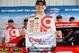 LONG POND, PA - AUGUST 01: Kyle Larson, driver of the #42 Target Chevrolet, poses with the Coors Light Pole Award after qualifying for the NASCAR Sprint Cup Series GoBowling.com 400 at Pocono Raceway on August 1, 2014 in Long Pond, Pennsylvania. (Photo