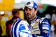 LONG POND, PA - AUGUST 02: Jimmie Johnson, driver of the #48 Lowe's Chevrolet, stands in the garage during practice for the NASCAR Sprint Cup Series GoBowling.com 400 at Pocono Raceway on August 2, 2014 in Long Pond, Pennsylvania. (Photo by Jerry Markla