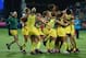 GLASGOW, SCOTLAND - AUGUST 02: Australia players celebrate winning the gold medal after the Women's Gold Medal Match against England at Glasgow National Hockey Centre during day ten of the Glasgow 2014 Commonwealth Games on August 2, 2014 in Glasgow, Sco