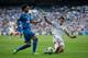 MADRID, SPAIN - SEPTEMBER 22: Angel Lafita (L) of Getafe CF competes for the ball with Alvaro Arbeloa (R) of Real Madrid CF during the La Liga match between Real Madrid CF and Getafe CF at Estadio Santiago Bernabeu on September 22, 2013 in Madrid, Spain.