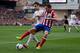MADRID, SPAIN - MARCH 02: Koke (R) of Atletico de Madrid competes for the ball with Alvaro Arbeloa (L) of Real Madrid CF during the La Liga match between Club Atletico de Madrid and Real Madrid CF at Vicente Calderon Stadium on March 2, 2014 in Madrid, Sp