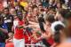 LONDON, ENGLAND - AUGUST 02: Yaya Sanogo of Arsenal celebrates scoring his 4th goal with fans during the Emirates Cup match between Arsenal and Benfica at the Emirates Stadium on August 2, 2014 in London, England. (Photo by Michael Regan/Getty Images)
