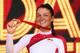 GLASGOW, SCOTLAND - AUGUST 03: Lizzie Armitstead of England celebrates with her gold medal after the Women's Cycling Road Race during day eleven of the Glasgow 2014 Commonwealth Games on August 3, 2014 in Glasgow, United Kingdom. (Photo by Ryan Pierse/G