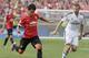 ANN ARBOR, MI - AUGUST 2: Shinji Kagawa #26 of Manchester United passes the ball against Asier Illarramendi #24 of Real Madrid which Gareth Bale then shot for a goal during the second half of the Guinness International Champions Cup at Michigan Stadium