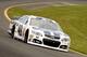 LONG POND, PA - AUGUST 03: Jimmie Johnson, driver of the #48 Lowe's Chevrolet, races during the NASCAR Sprint Cup Series GoBowling.com 400 at Pocono Raceway on August 3, 2014 in Long Pond, Pennsylvania. (Photo by Elsa/Getty Images)
