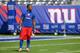 EAST RUTHERFORD, NJ - SEPTEMBER 15: Wide receiver Victor Cruz #80 of the New York Giants warms up before the game against the Denver Broncos at MetLife Stadium on September 15, 2013 in East Rutherford, New Jersey. (Photo by Ron Antonelli/Getty Images)
