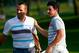AKRON, OH - AUGUST 03: Sergio Garcia of Spain congratulates Rory McIlroy of Northern Ireland on his win after putting on the 18th green during the final round of the World Golf Championships-Bridgestone Invitational at Firestone Country Club South Course