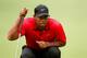 AKRON, OH - AUGUST 03: Tiger Woods lines up a putt on the first green during the final round of the World Golf Championships-Bridgestone Invitational at Firestone Country Club South Course on August 3, 2014 in Akron, Ohio. (Photo by Gregory Shamus/Getty