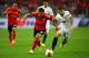 TURIN, ITALY - MAY 14: Miralem Sulejmani of Benfica vies with Alberto Moreno of Sevilla during the UEFA Europa League Final match between Sevilla FC and SL Benfica at Juventus Stadium on May 14, 2014 in Turin, Italy. (Photo by Clive Rose/Getty Images)