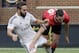 ANN ARBOR, MI - AUGUST 2: Dani Carvajal #15 of Real Madrid tangles up with Michael Keane #38 of Manchester United during the first half of the Guinness International Champions Cup at Michigan Stadium on August 2, 2014, in Ann Arbor, Mich (Photo by Duane