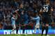 MANCHESTER, ENGLAND - NOVEMBER 24: Younes Kaboul and Michael Dawson of Tottenham Hotspur look on dejected as Manchester City celebrate after the Barclays Premier League match between Manchester City and Tottenham Hotspur at Etihad Stadium on November 24,