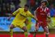 VILLARREAL, SPAIN - DECEMBER 21: Mateo Musacchio (L) of Villarreal competes for the ball with Ivan Rakitic of Sevilla during the La Liga match between Villarreal CF and Sevilla FC at El Madrigal on December 21, 2013 in Villarreal, Spain. (Photo by Manue