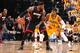 INDIANAPOLIS, IND - MAY 20: LeBron James #6 of the Miami Heat handles the ball against Paul George #24 of the Indiana Pacers in Game Two of the Eastern Conference Finals during the 2014 NBA Playoffs at Bankers Life Fieldhouse on May 20, 2014 in Indianapol