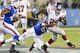 CANTON, OH - AUGUST 3: Defensive end Bryan Johnson #67 of the Buffalo Bills tackles running back Michael Cox #29 of the New York Giants at the 2014 NFL Hall of Fame Game at Fawcett Stadium on August 3, 2014 in Canton, Ohio. (Photo by Jason Miller/Getty Im