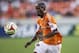 Aug 3, 2014; Houston, TX, USA; Houston Dynamo defender DaMarcus Beasley (21) chases the ball during the first half against D.C. United at BBVA Compass Stadium. Mandatory Credit: Troy Taormina-USA TODAY Sports