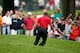 AKRON, OH - AUGUST 03: Tiger Woods hits out of the rough on the second hole during the final round of the World Golf Championships-Bridgestone Invitational at Firestone Country Club South Course on August 3, 2014 in Akron, Ohio. (Photo by Gregory Shamus