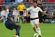 TORONTO, ON - JULY 24: Riccardo Sapanara #8 of AC Milan gets the ball past Dimitris Kolovos #12 of Olympiacos FC during International Champions Cup 2014 action at BMO Field July 24, 2014 in Toronto, Ontario, Canada. (Photo by Abelimages/Getty Images)