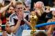 RIO DE JANEIRO, BRAZIL - JULY 13: Andre Schuerrle of Germany looks at the World Cup trophy after defeating Argentina 1-0 in extra time during the 2014 FIFA World Cup Brazil Final match between Germany and Argentina at Maracana on July 13, 2014 in Rio de