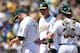 OAKLAND, CA - AUGUST 02: Manager Bob Melvin #6 of the Oakland Athletics take the ball from Jon Lester #31 taking him out of the game in the top of the seventh inning against the Kansas City Royals at O.co Coliseum on August 2, 2014 in Oakland, California