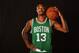 TARRYTOWN, NY - AUGUST 3: James Young #13 of the Boston Celtics poses for a portrait during the 2014 NBA rookie photo shoot on August 3, 2014 at the Madison Square Garden Training Facility in Tarrytown, New York. NOTE TO USER: User expressly acknowledges