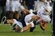 PROVO, UT - SEPTEMBER 7: Alani Fua #5 of BYU Cougars sacks quarterback David Ash #14 of the Texas Longhorns during the first half of an NCAA football game September 7, 2013 at LaVell Edwards Stadium in Provo, Utah. (Photo by George Frey/Getty Images)