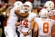 SAN ANTONIO, TX - DECEMBER 29: David Ash #14 of the University of Texas Longhorns celebrates a touchdown against the Oregon State Beavers during the Valero Alamo Bowl at the Alamodome on December 29, 2012 in San Antonio, Texas. Texas won the game 31-27.