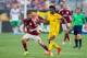 CHARLOTTE, NC - AUGUST 02: Raheem Sterling #31 of Liverpool controls the ball in front of Riccardo Saponara #8 of A.C. Milan during first half action in the Guinness International Champions Cup at Bank of America Stadium on August 2, 2014 in Charlotte, No