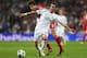 MADRID, SPAIN - APRIL 23: Angel Di Maria of Real Madrid is challenged by Javi Martinez of Bayern Muenchen during the UEFA Champions League semi-final first leg match between Real Madrid and FC Bayern Muenchen at the Estadio Santiago Bernabeu on April 23,