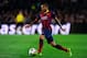 BARCELONA, SPAIN - MARCH 12: Dani Alves of FC Barcelona runs with the ball during the UEFA Champions League Round of 16 second leg match between FC Barcelona and Manchester City at Camp Nou on March 12, 2014 in Barcelona, Spain. (Photo by David Ramos/Ge