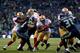 SEATTLE, WA - JANUARY 19: Running back Frank Gore #21 of the San Francisco 49ers runs the ball against the Seattle Seahawks in the first half during the 2014 NFC Championship at CenturyLink Field on January 19, 2014 in Seattle, Washington. (Photo by Ron