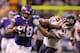 MINNEAPOLIS, MN - DECEMBER 1: Adrian Peterson #28 of the Minnesota Vikings carries the ball for ten thousand career rushing yards against Chris Conte #47 of the Chicago Bears on December 1, 2013 at Mall of America Field at the Hubert Humphrey Metrodome i