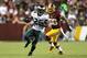 LANDOVER, MD - SEPTEMBER 09: Running back LeSean McCoy #25 of the Philadelphia Eagles runs the ball in front of inside linebacker Perry Riley #56 of the Washington Redskins in the first half at FedExField on September 9, 2013 in Landover, Maryland. (Pho