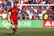 Jun 7, 2014; Landover, MD, USA; Spain midfielder Xavi (8) dribbles the ball against El Salvador at FedEx Field. Mandatory Credit: Geoff Burke-USA TODAY Sports