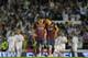 VALENCIA, SPAIN - APRIL 16: Lionel Messi (L) and Xavi Hernandez of Barcelona react after Real Madrid scored their opening goal during the Copa del Rey Final between Real Madrid and Barcelona at Estadio Mestalla on April 16, 2014 in Valencia, Spain. (P