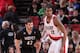 PORTLAND, OR - JANUARY 25: Kevin Love #42 of the Minnesota Timberwolves and LaMarcus Aldridge #12 of the Portland Trail Blazers battle for position on January 25, 2014 at the Moda Center Arena in Portland, Oregon. NOTE TO USER: User expressly acknowledge