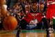 BOSTON, MA - APRIL 16: John Wall #2 of the Washington Wizards waits to defend against the Boston Celtics in the second half during the game at TD Garden on April 16, 2014 in Boston, Massachusetts. NOTE TO USER: User expressly acknowledges and agrees that