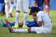 NATAL, BRAZIL - JUNE 24: Luis Suarez of Uruguay and Giorgio Chiellini of Italy react after a clash during the 2014 FIFA World Cup Brazil Group D match between Italy and Uruguay at Estadio das Dunas on June 24, 2014 in Natal, Brazil. (Photo by Matthias H