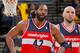 OAKLAND, CA - JANUARY 28: Teammates Nene #42 and Marcin Gortat of the Washington Wizards while facing the Golden State Warriors on January 28, 2014 at Oracle Arena in Oakland, California. NOTE TO USER: User expressly acknowledges and agrees that, by downl