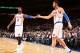 NEW YORK, NY - DECEMBER 6: J.R. Smith #8 of the New York Knicks high fives teammate Andrea Bargnani #77 of the New York Knicks during a game against the Orlando Magic at Madison Square Garden in New York City on December 6, 2013. NOTE TO USER: User expre